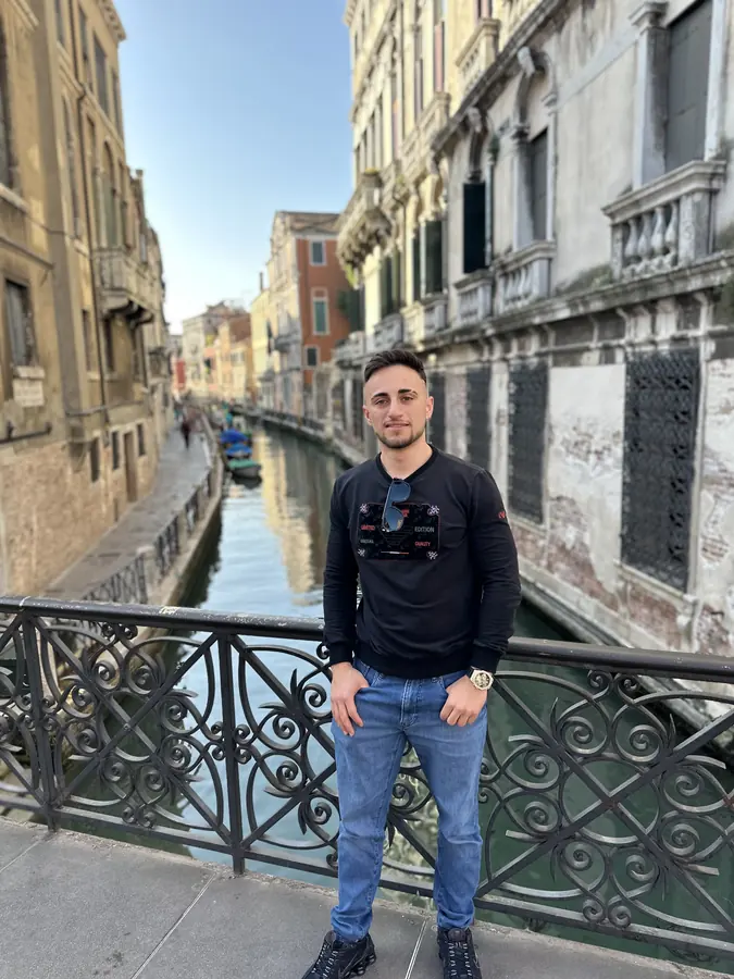 Federico on a bridge over a canal in Venice